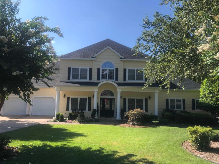 Stunning two story lake front home! 4 Bedrooms,4 full baths. Enter light filled living areas with palladian windows at front and back of main floor. Cherry hardwood floors throughout main level. Neutral paint colors throughout home. Formal Dining and breakfast area. Dedicated office with built in cabinetry. Soaring coffered ceiling in great room, gas logs and built in cabinetry. Kitchen with granite slab island and countertops, stainless steel appliances, walk in pantry. Large laundry room with storage and sink. Beautiful Butler's Pantry connecting kitchen to dining room with bar sink and under counter refrigerator. Primary bedroom with lake views, Large walk in closet with built in storage drawers and seating bench. Primary bath with dual sinks, vanity area, jetted tub and massive walk in shower with two shower heads, seating bench. French doors from Great Room to large covered deck with decorative concrete floor. Easy access to Lighted Covered Boat Dock and Yac Port (for Kayaks) Professionally landscaped grounds. 110 Seawall. Home Generator with 500 gallon buried propane tank. HSV  POA $2000.00 new member buy in fee due at closing.