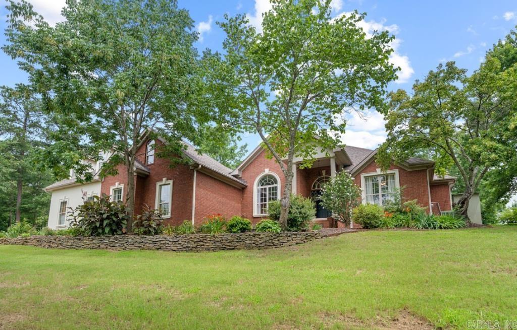 Welcome to this luxurious dream home in St. Charles Place, beautifully remodeled in 2023. This custom-built residence boasts an open floor plan, gourmet kitchen, two living rooms, formal dining, and 6 spacious bedrooms on a professionally landscaped 0.6-acre corner lot. Featuring a new roof, 3-car attached garage, a 30'x40' heated/cooled shop with an RV lean-to and guest offering gorgeous Hot Springs views. Located in the desirable Lakeside School District, this estate is the perfect retreat!