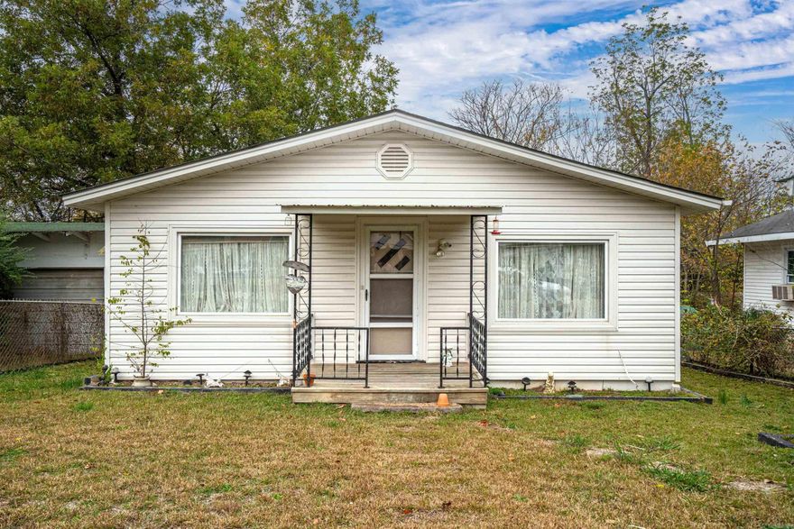 Welcome to your Urban Oasis!   This beautiful bungalow is ideally situated in the heart of Hot Springs & close to Central Ave. Enjoy an abundance of natural light throughout the day, thanks to large updated windows that also offer picturesque views of the surrounding neighborhood. Wonderful spacious floor plan and real hardwood floors in some rooms. There is inside access to a large basement downstairs that makes for lots of storage space. The property features a good-sized fully fenced yard as well as a carport.   Make city living a joy with this spacious full of character and charm city bungalow and all it has to offer!