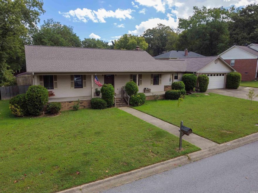 Lovely home in Western Hills with a large family room with vaulted ceilings & wood-burning fireplace, spacious dining area, breakfast bar, loads of cabinets in the kitchen, 3 spacious bedrooms with walk-in closets, fenced backyard, patio, storage shed, beautiful wood floors in the foyer, dining & kitchen, 2x8 exterior walls, new water heater, 2-car garage, and more.  Roof was replaced in 2021.  Great location! Check out the video link above for a virtual tour!