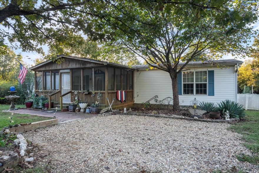 This magnificent 4 bed 2 bath mobile sits completely secluded from everything on 9 acres +/- with a good sized stocked pond, huge shop, 2 storage buildings that convey with the property and even a cabin in the woods! With quite a few updates on the inside of this meticulously maintained home, it's ready for your family to gather and enjoy the holidays, birthdays or just some good family time together! The shop is also very well maintained and has power and 3 bay doors! The land has several trails cut out for walking also so you can enjoy all its serenity! A cabin in the woods has power and is perfect for a hangout spot, a workshop or just storage if thats what your needs are! This property is truely one of a kind and is just waiting for you to make it your own! Schedule your own private showing today!