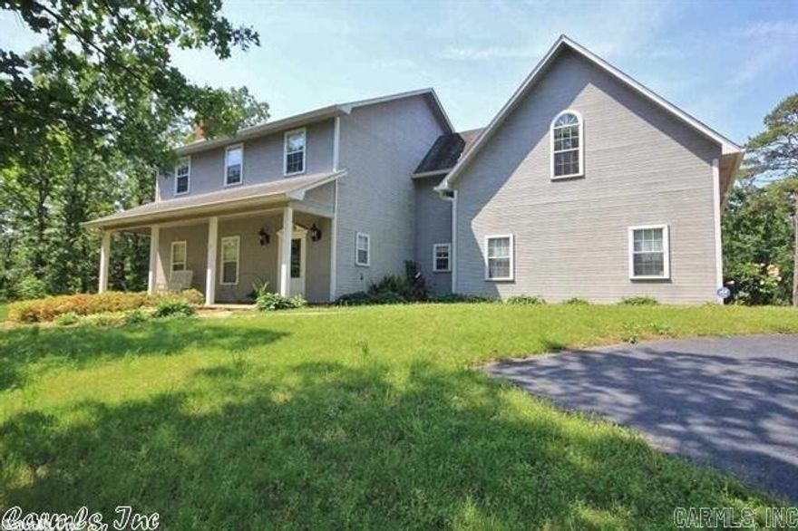 Beautiful 4BR/2.5BA home in a gated, private and peaceful setting. Just minutes from town. Community trails and pond.