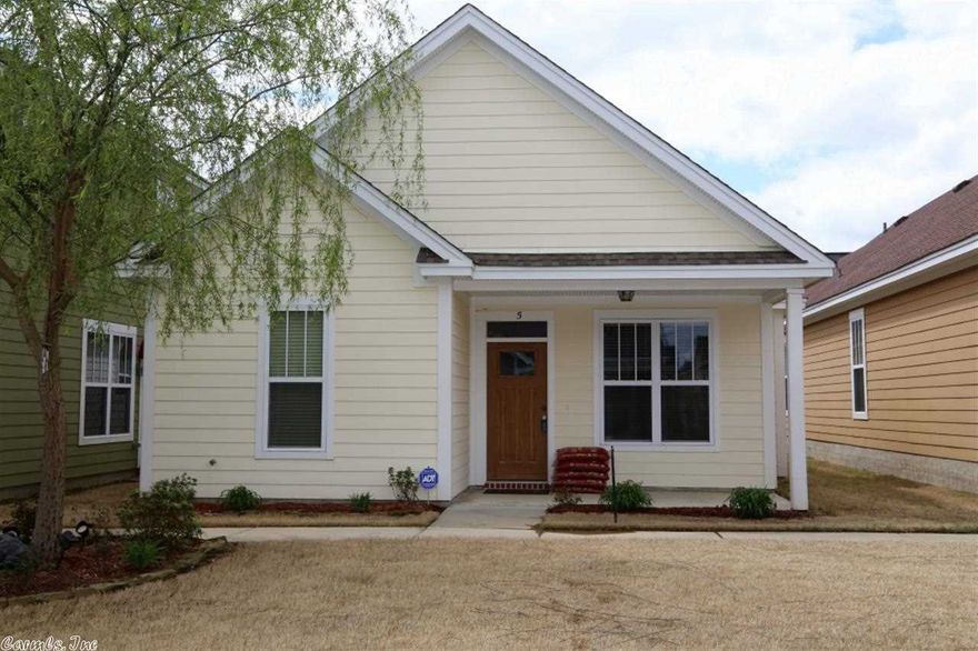 This great craftsman style 3 bedroom 2 bath courtyard home has many desirable features including a fabulous front porch, gas fireplace, granite counter tops, stainless appliances, stained concrete flooring in living room, kitchen and all wet areas. Beautiful courtyard area right out your front door, subdivision pool and workout room.