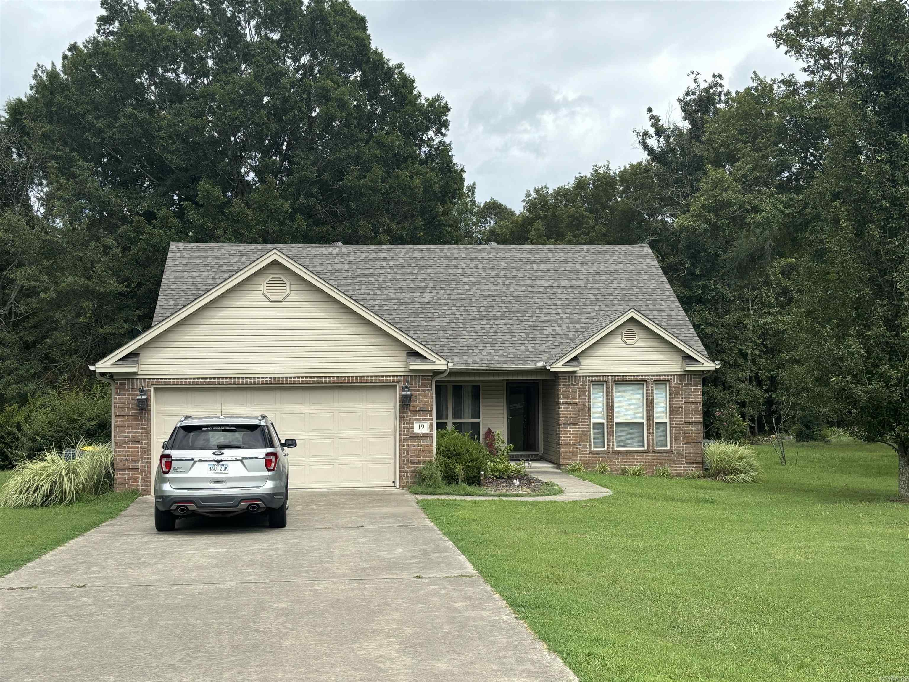 Looking for a beautiful home on acreage close to everything? This is your home! Beautiful 3 bedroom, 2 bath home on 1.5acre! Split floor plan with 2 bedrooms sharing a bathroom on one side and masterbedroom with large masterbath featuring claw foot tub, double sinks, separate shower, and large walkin closet! Kitchen has gorgeous stained cabinets & granite countertops! Enjoy watching the deer from your big covered back porch! Has a portable out building for you lawn utensils! Don't miss out on this amazing property!