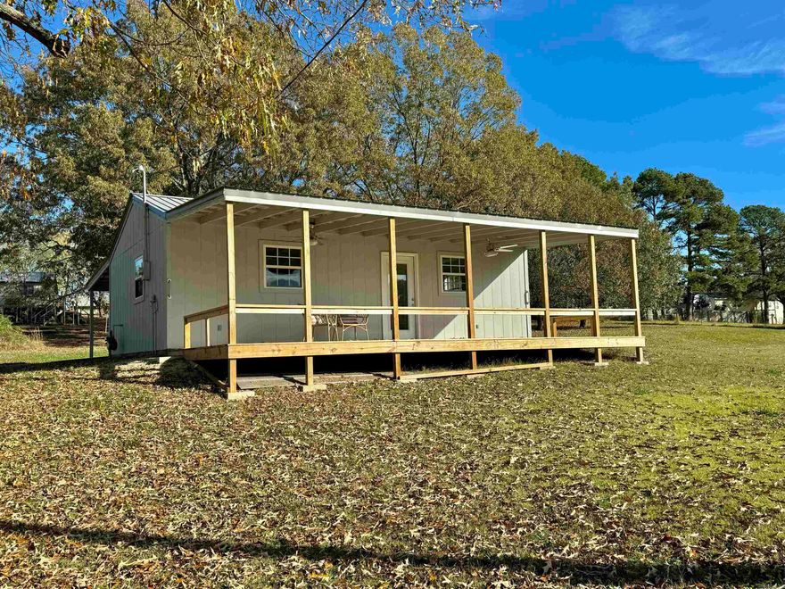 COMPLETELY REMODELED HOME with a GREAT VIEW! This 1 bedroom, 1 bath home has a private setting with a large back deck overlooking the neighboring pasture and pond. The home has been completely remodeled and offers an open floor plan, new kitchen with stainless appliances, and a master bedroom with an attached full bathroom with walk in shower and a large walk in closet. There is a 1 vehicle carport with an attached storage room.  Large lot with room to build a shop!  *AGENT OWNED*