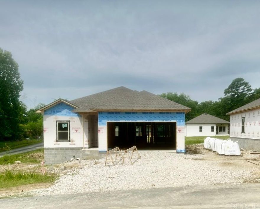 A LANCE LEVI CONSTRUCTION- New Quality Built Home!! Immaculate, new construction home is a true showcase of modern luxury and craftsmanship.This 3-bedroom, 2-bath all electric home, including the water heather & central heat, offers the perfect blend of style, comfort, and functionality. With luxuryvinyl plank flooring by Shaw and granite/quartz countertops, in kitchen and baths, the interior is designed with an elegant, contemporary feel. The homefeatures 9-foot ceilings that create an airy, open atmosphere, while insulated doors and walls enhance energy efficiency. The primary suite is a privateretreat, complete with a luxurious walk in shower. The exterior is equally impressive, with a striking brick facade with vinyl soffit & metal fascia, and afiberglass front door that provides both durability and curb appeal. Enjoy the convenience of a 2-car garage with insulated walls & doors, a covered backpatio, and a sprinkler system on its own meter, ensuring the lush landscaping is always well-maintained. Whether you're looking for a stylish new home or apractical space with all the modern amenities, this property is a must-see. Schedule a tour today to experience the comfort and quali