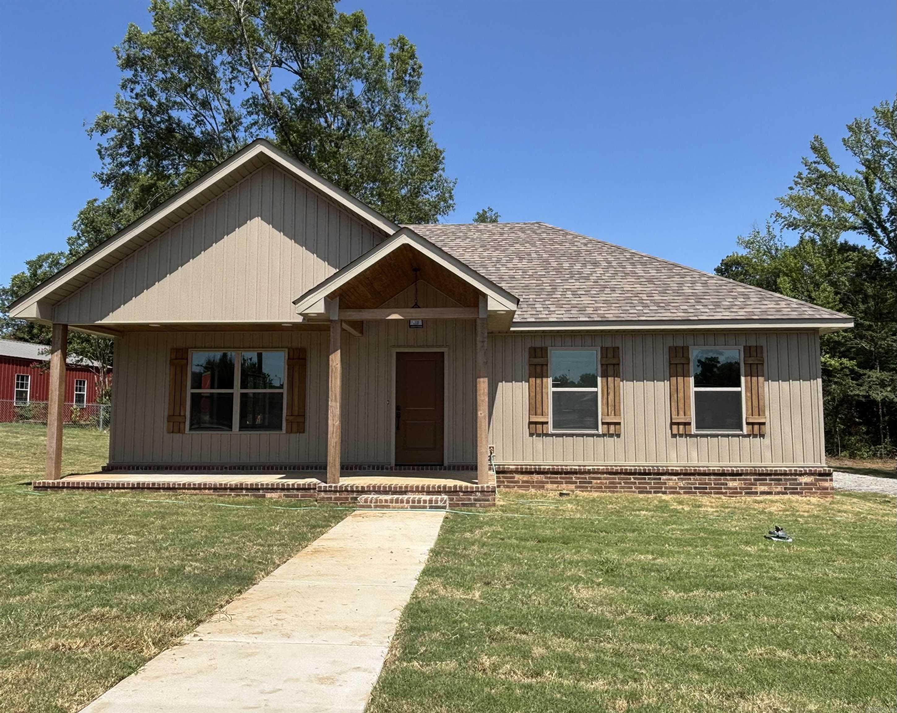Come see this incredible 2-bedroom, 2-bath home in Sheridan. Brand-new with a one-year warranty. The builder is adding the final touches. The interior offers granite countertops, luxurious vinyl planking, and a kitchen with a spacious island, ample cabinets, and a walk-in pantry. Spacious laundry room. Both bedrooms feature walk-in closets. The master bathroom has a huge shower! This home has tons of closets. Nice carport on back. Huge side yard. You will not be disappointed with this house's finesse. One of the best builders around!