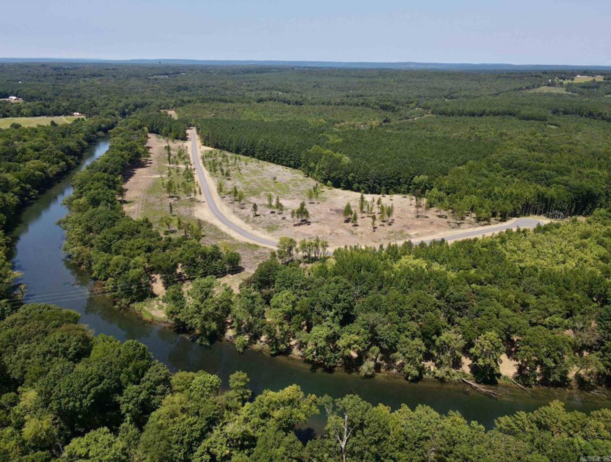 Located just north of Pangburn and just south of Heber Springs, this is a perfect, affordable location for rural living. Access to a private, gated boat launch that's 3.2 milesupriver from Ramsey's Access, and 2.6 miles downriver from Dripping Springs Access. Don't overlook the small parcel size for opportunities to view wildlife too. There is anabundance of wildlife on this property. If you're looking for privacy and the tranquility of the outdoors, this property is well suited for you. A mature pine buffer on thenorth, and tucked away off of a county road, this property is a peaceful getaway. Conveniently located just outside of Pangburn, and minutes from Heber Springs, thisproperty is in an outstanding location. The country life with the amenities of town just a few miles down the road. The Dam Site Boat Launch on Greers Ferry Lake is just15 miles to the north.