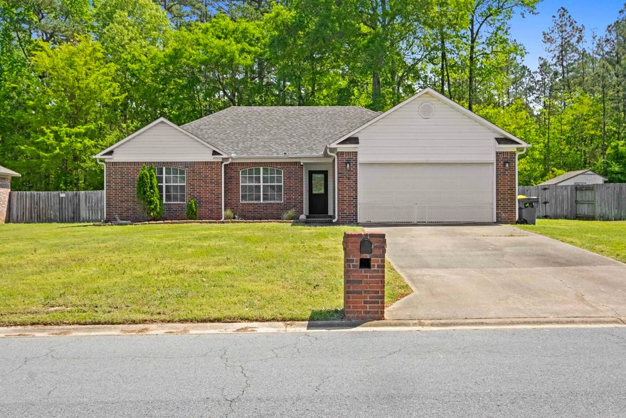 Welcome to 16 Cedarwood Drive in Cabot! This charming 3 bedroom, 2 bathroom home offers 1,530 square feet of comfortable living space in the highly sought-after Cabot School District. The updated kitchen features granite countertops, a breakfast bar, and plenty of cabinet space—perfect for everyday living and entertaining. The primary suite includes a tray ceiling, jetted tub, and a spacious layout for your own private retreat.  Step outside to enjoy the fully fenced backyard, complete with a covered deck, a cozy fire pit area, and a storm shelter for peace of mind. Whether you're hosting friends or enjoying a quiet evening under the stars, this outdoor space is ready for it all. See Agent remarks!