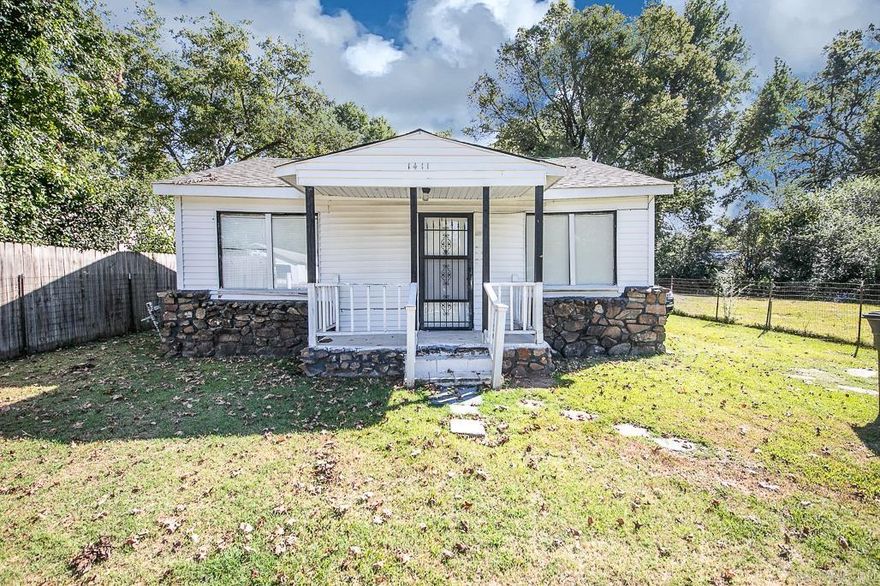 This fixer upper has tons of potential...Could be used for commercial purposes too!  Front room could also be a 3rd bedroom.  Refrigerator and stove convey.  Roof 5 years old.  Completely fenced.  See Agent Remarks.