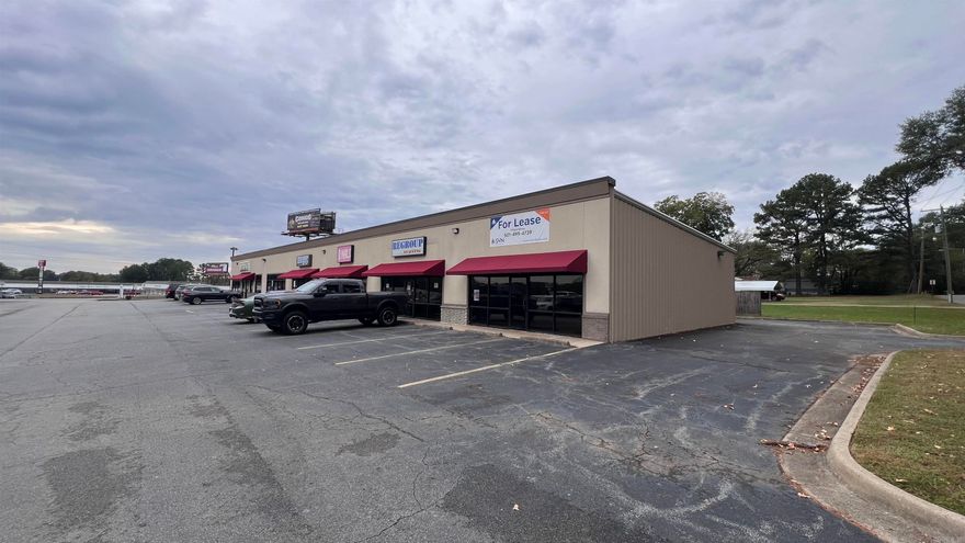 1,250 SF suite available for lease at 22000 I-30 Frontage Road in Bryant. The space features an open floor plan with modern finishes, high ceilings, and a kitchenette with built-in counter space and appliances. Offered at $14.40 per square foot on a modified gross lease, with tenant responsible for utilities and common area maintenance. Ideal for retail, office, or service-oriented uses.   1,250 SF available $14.40 PSF, modified gross Tenant pays utilities and common area maintenance Open floor plan with modern finishes High ceilings with exposed beams Kitchenette with counter space, sink, and refrigerator Convenient Bryant location along I-30 frontage Flexible space for retail, office, or service use