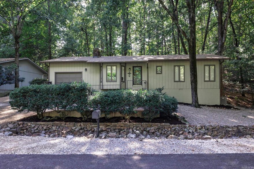 Charming Updated Home Along Desoto Multipurpose Trail. Welcome to your perfect retreat. This adorable 2-bedroom, 2-bath home w a 1-car garage is nestled along the scenic Desoto Multipurpose Trail, offering peaceful surroundings & modern comfort. Recent Upgrades Include: - new kitchen w updated appliances 2024 - new flooring 2023 - added insulation 2023 - new roof (2024) & new HVAC system (2025) - fresh exterior paint & refreshed landscaping  Step outside to your private patio where you can unwind to the soothing sounds of a babbling brook from the forest next door. Whether you're sipping morning coffee or enjoying evening sunsets, nature is always within reach. Prime Location: - walking distance to Desoto Lake - close to shopping, dining, POA pool and pickleball courts. This move-in-ready gem combines tranquility, convenience and style.  Don’t miss your chance to own a slice of serenity with all the modern touches.   HSV is America’s largest gated community covering 26,000 acres w over 500 miles of paved streets. There are nine golf courses, thirty miles of walking trails & eleven lakes for fishing, boating & kayaking. HSV is located 15 miles from Hot Springs & Oaklawn Racing.