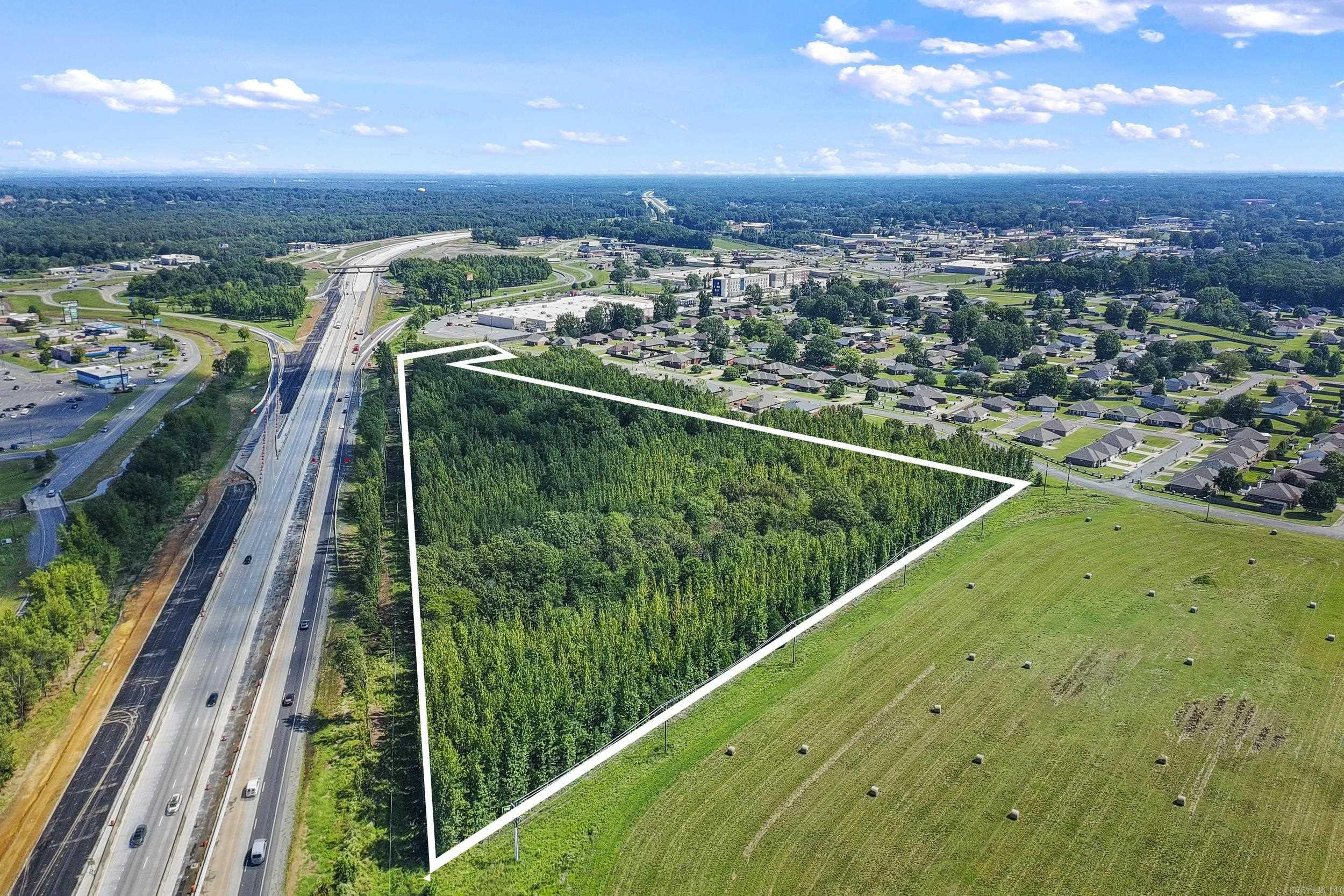 Development Site offers an opportunity for up to 100 Town Homes, and/or Senior Living Community! Located in an area of commercial explosive growth, this 15.27 acre parcel provides quick, easy access to HWY 57, nearby shopping and entertainment options! Established nearby is the Westhaven Place, a gated Senior Living Neighborhood, for ages 55+. This premier site is ready for development!