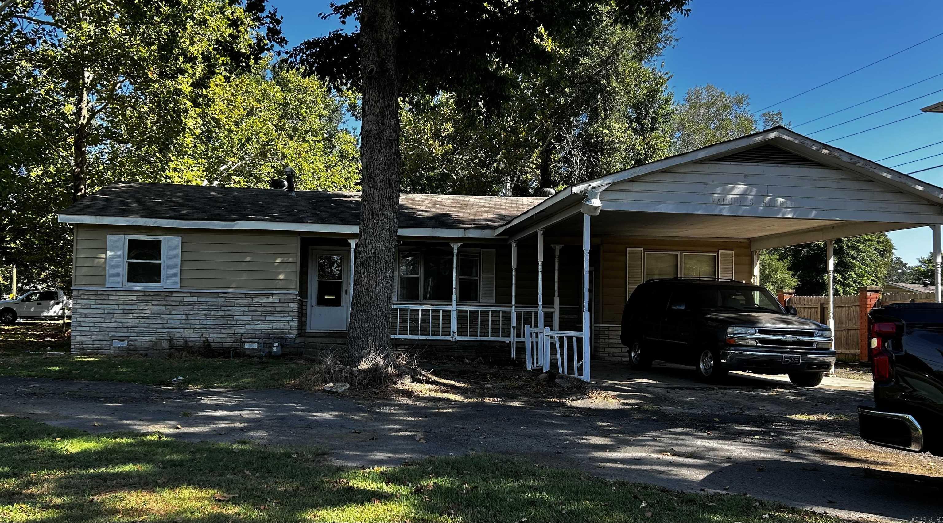 Unique investment opportunity on 1.63 acres with a duplex offering two separate living spaces. The main unit is approx. 1,300 sq ft with 2 bedrooms, 1 bath, a full kitchen, and covered porch with direct entry to a connected shop. The shop includes a storage area and a half bath, adding versatility for hobbies, projects, or additional use. The second unit is approx. 600 sq ft and features 1 bedroom, 1 bath, a kitchen, and laundry areaāideal as a rental, guest suite, or multi-generational living. With ample yard space and two distinct residences, this property provides flexibility, privacy, and long-term potential. There is a current tenant in the smaller unit. 24 hour notice is required to see the occupied unit. No Seller Property Disclosure will be provided. Property to be sold as is where is with no warranties. See associated documents for aerial view.