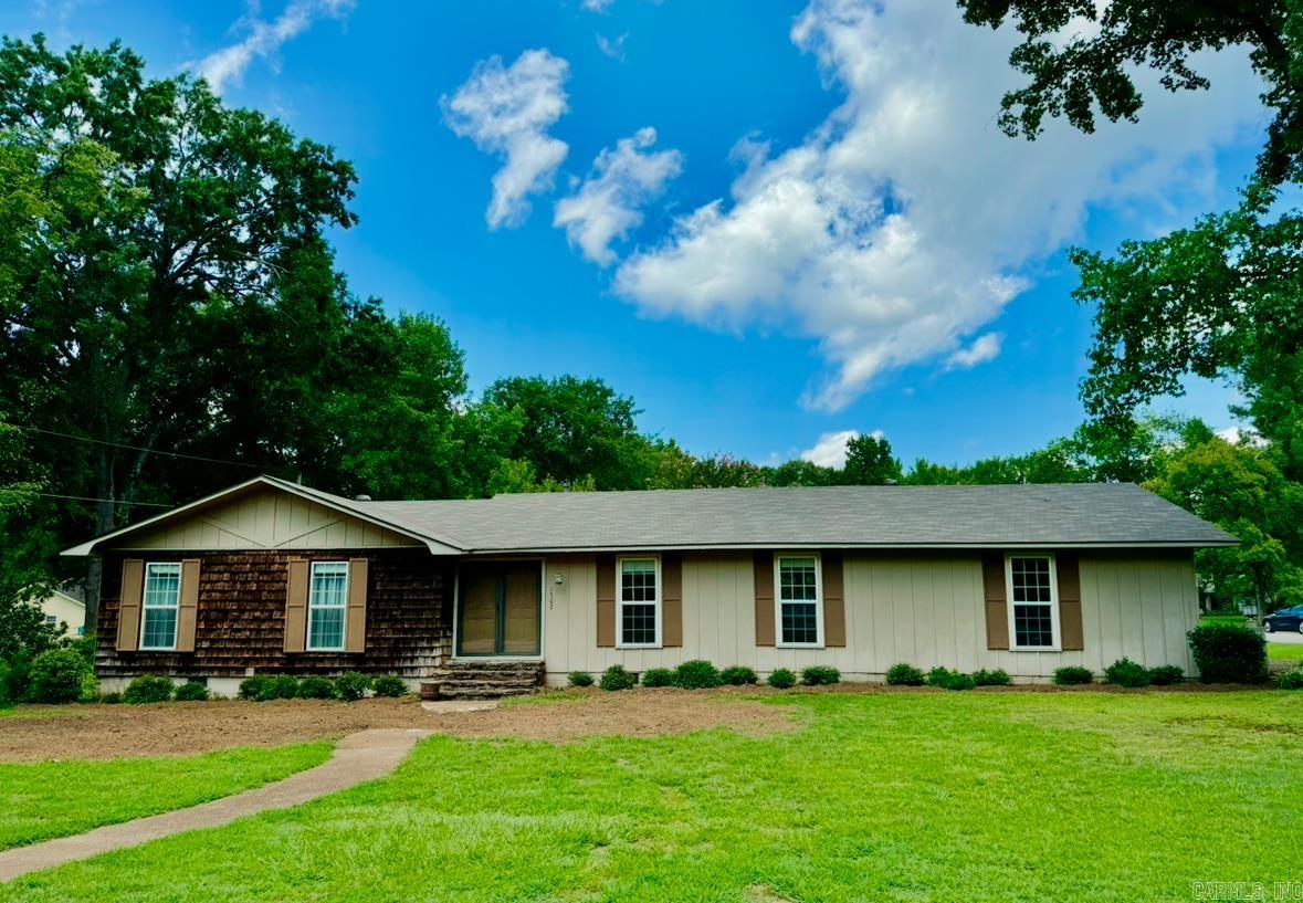 Discover the perfect blend of convenience, charm, comfort and community living in this delightful 3-bedroom, 2-bath home with 1675 sf.! New energy-efficient windows, gutters, and a new roof installed less than a year ago. A new shower will added to the master bath. Located on a spacious corner lot, this residence offers everything you need to feel right at home and is perfect for an Airbnb close to Harding. Enjoy large double front doors with full glass panels in the entryway. With the extra dining room space, you may use as a formal living room, ideal for entertaining guests. The spacious den features a stunning stone fireplace, complete with a hearth, mantle and gas logs. Original cabinetry, spacious countertops, and a lovely breakfast nook with large bay windows offer a picturesque view of the expansive backyard. Perfect for gardening or outdoor activities, the backyard also features a patio area for relaxing or entertaining. This home has hardwood floors in the main areas and comfortable carpeted bedrooms. A two-car open garage provides easy access, along with a separate storage. Don't miss this home! It is waiting for you!