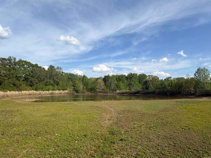 Five Acres with POND!!! Enjoy this rural land at an unbelievable value in the Cabot Public School District. Property is being sold AS IS— personal property, house, and sheds will convey at no value. Property may be purchased along with 373 Heather Loop— for a total of 10 acres! Agents see remarks!