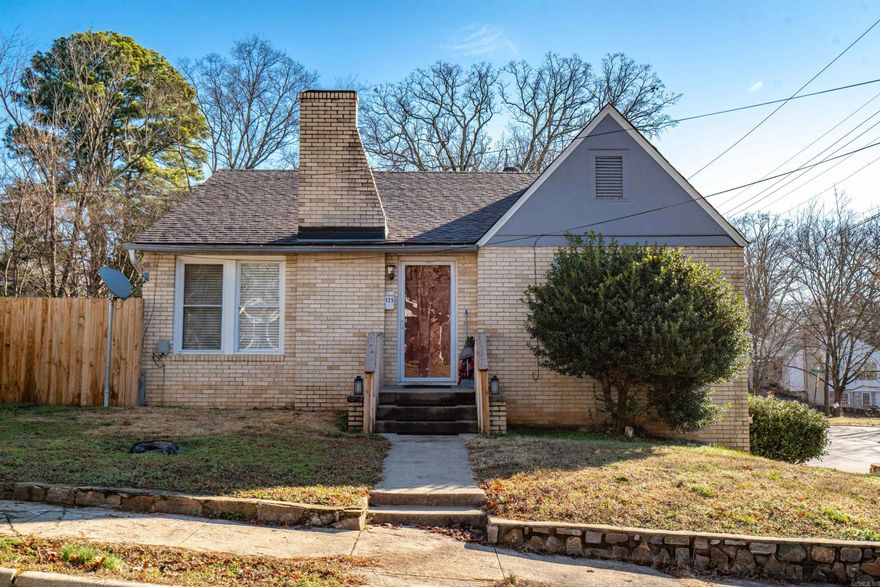 This Unique older home on an oversized corner lot is located near downtown Hot Springs, built in 1945 and split into an Upstairs/Downstairs Duplex.  The upper unit, 125 Pinewood is approximately 1250 sf and the lower unit/ is 1300 Glenwood.  Each unit is a 2 bedroom, 1 bath updated with refinished original hardwood floors and new bathrooms. The lower unit has been remodeled and is well equipped with new cabinets, countertops, appliances, kitchen flooring and new island.   Storage Building and covered parking, new roof 2024. Excellent Rental History - Great opportunity for investors or a homeowner enjoying rental income from one of the units.  Selling "as is". Schedule your appointment to view this rare investment opportunity!