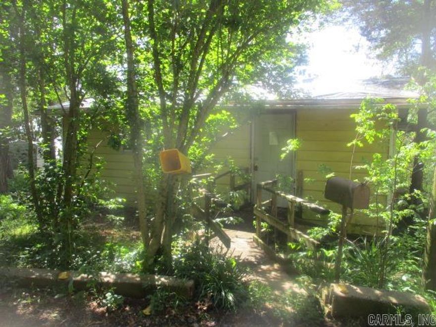 Check this out - a Price Reduction!!! Located off the corner of Hwy 300 and Catfish Loop features this home on Lake Harris Brake. This home features one bedroom one bath with an open area that consists of living room, dining area, and the kitchen. The sun room in the back of the home is a nice bonus. Call today for detail ... log on www.hudhomestore.gov to submit offers and www.olympusams-at.com for management information. HUD case #031-319803 - "HUD homes are sold AS IS".