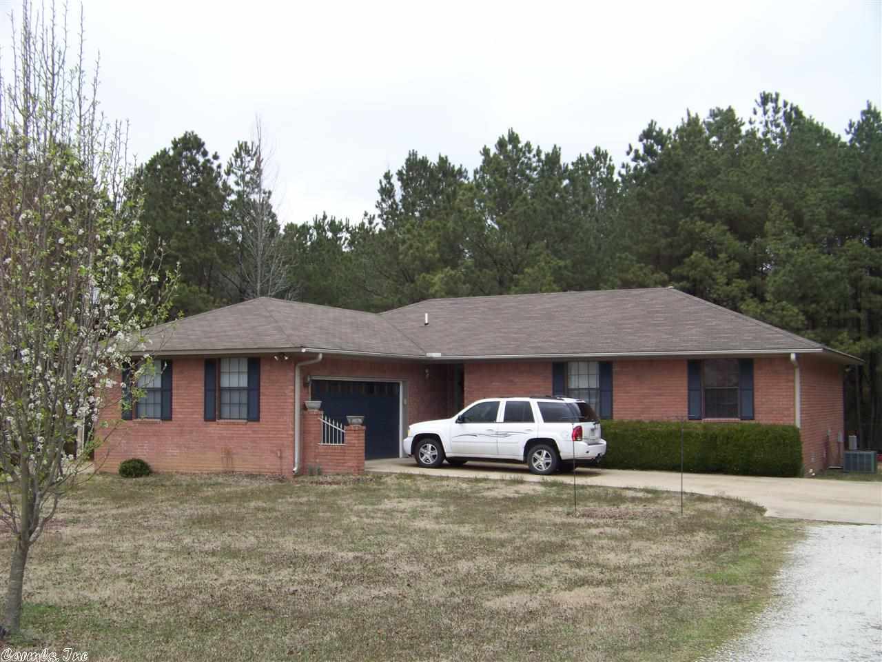 LOVELY 3 BEDROOM, 2 BATH BRICK HOME ON 1.49 ACRES IN OUACHITA SCHOOL DISTRICT MANY EXTRAS, BAY WINDOW, 2 CAR GARAGE, FIREPLACE, HARDWOOD FLOORS AND MUCH MORE THIS HOME IS A MUST SEE!!!!