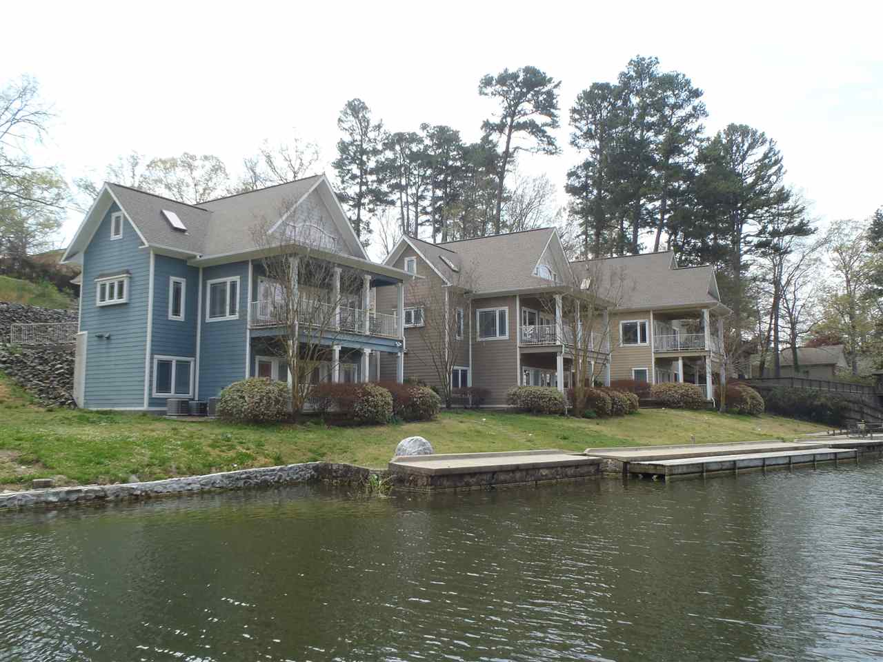 3 Homes on Lake Hamilton currently used as nightly weekly rental. 120 is a 5 bdr 3 ba with 2352 sqft. 121 is a 4 bdr 3 ba with 2196 sqft. 122 is a 4 bd 3 ba with 2196 sqft. All were built in 2006 and are in good condition. Lot has about 150 feet on the lake with a 1 stall dock, boardwalk and seawall. All units have open floor plan. Lower floors all have kitchenettes in them. Selling all units fully furnished and ready for new owner to have a walk in business. Numbers are up even in 2020 with $152,000 a year