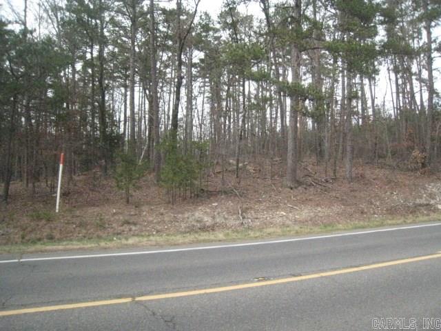 0.82 Acres of nice laying land on very busy highway across from Belvedere. Great home site or commercial possibilities.
