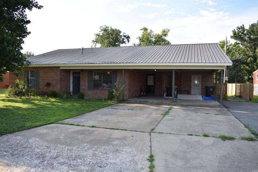 3 bedroom 2.5 bath home located in the Walnut Ridge school district. This home features 2,185 square feet of space including an office and formal dining room. New wood privacy fenced back yard that contains an out building which will remain with the property. 2-car carports with outside storage rooms, large covered back porch with doors from the dinning room and office to connect to the home. Located in the desirable Benson subdivision with convenient access to shopping and restaurants in Walnut Ridge. The interior has been upgraded with flooring and new paint inside the home. 1 bedroom still needs flooring to be replaced