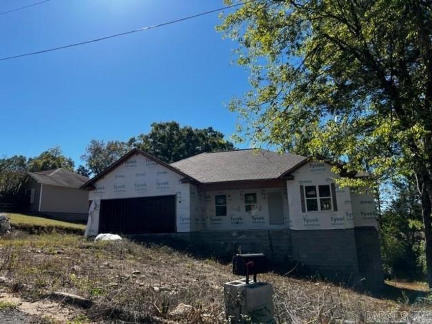 This unfinished 2022 construction has completed electrical, plumbing, framing and roof, offering an opportunity to bring your vision to life.  Property to be sold As-Is.  Title to convey via Special Warranty Deed.  Centennial does not require the purchaser to obtain financing, purchase insurance or any other bank product from Centennial as a condition of this contract.