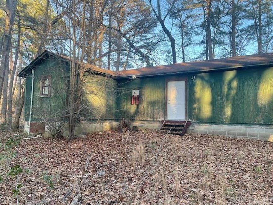 This home sits back on a private, wooded lot and has tons of potential! Contact your local agent today to get more info and to schedule a private showing.