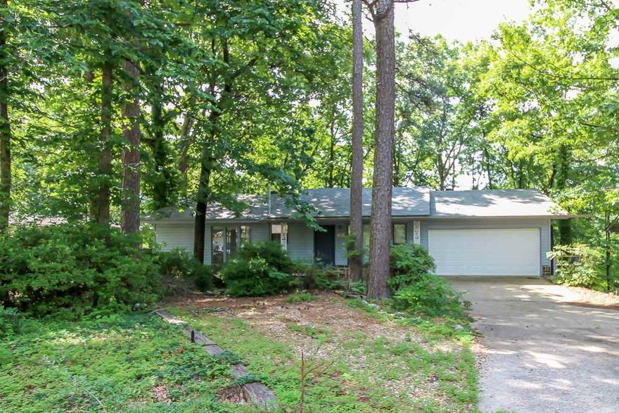 Established neighborhood near west end of Village and convenient to so many amenities nearby.  Everything for life is on the entry level - 2 br/2 ba, kitchen dining, great room - with fireplace.  Lower level bedroom and bath for guests (approx. 600 s.f.) cooled separately.  Nice screened porch, level driveway and oversize garage.