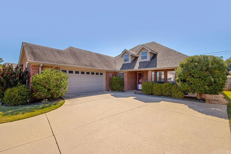 Exquisite Residence in the Arkansas Fabulous Country Club! Indulge in the meticulously maintained open floor plan that welcomes you upon entry. The expansive living area boasts a warm gas log fireplace, creating a cozy ambiance. Step into the kitchen with gas range, gleaming stainless-steel appliances, pantry, a convenient breakfast bar, and a charming breakfast room. The primary suite stands apart, adorned with a bay window that bathes the space in natural light, and a spa-like ensuite bathroom for your relaxation. Each of the generously sized bedrooms is accompanied by its own walk-in closet, offering ample storage and comfort. Outside, a fenced backyard awaits, complete with a covered patio for year-round enjoyment, and enhanced landscaping that adds a touch of nature's beauty.  Ideally located in close proximity to golf course, restaurants, shopping, hiking trails and so much more! HVAC 2022, Water Heater 2022.