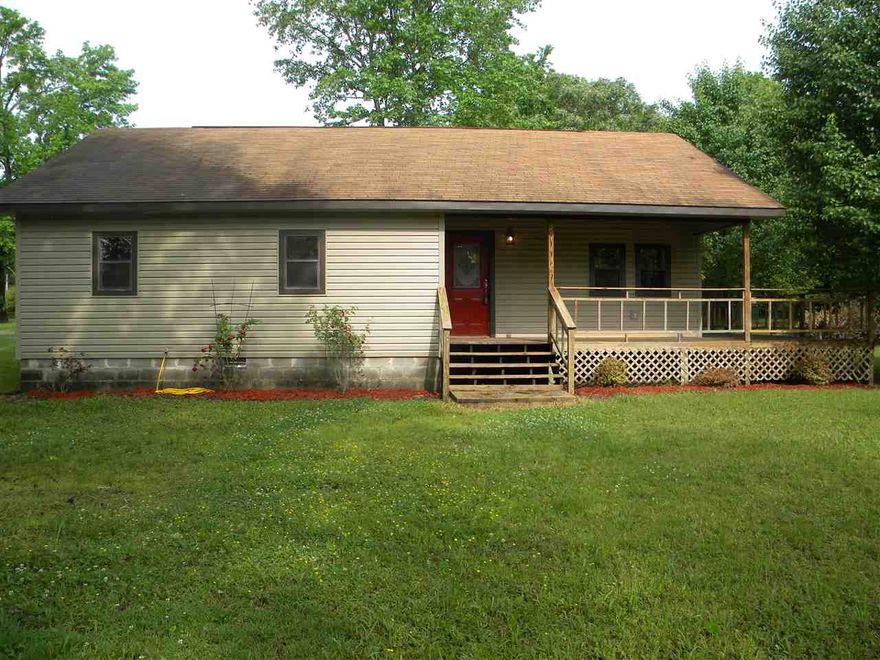 Great little house for investors, newlyweds, retirees. This house is like brand new. New siding, new flooring, new cabinets, new lights, new heat/air unit. Roof replaced in 2008. Hot water heater replaced. This house is very energy efficent. Has 2 x 6 walls. Has a wet weather creek that runs along property to enjoy from covered porch or side deck. Watch nature come to life in Spring. House is ten minutes from Searcy. This house is in the flood zone and will require flood insurance if financed.