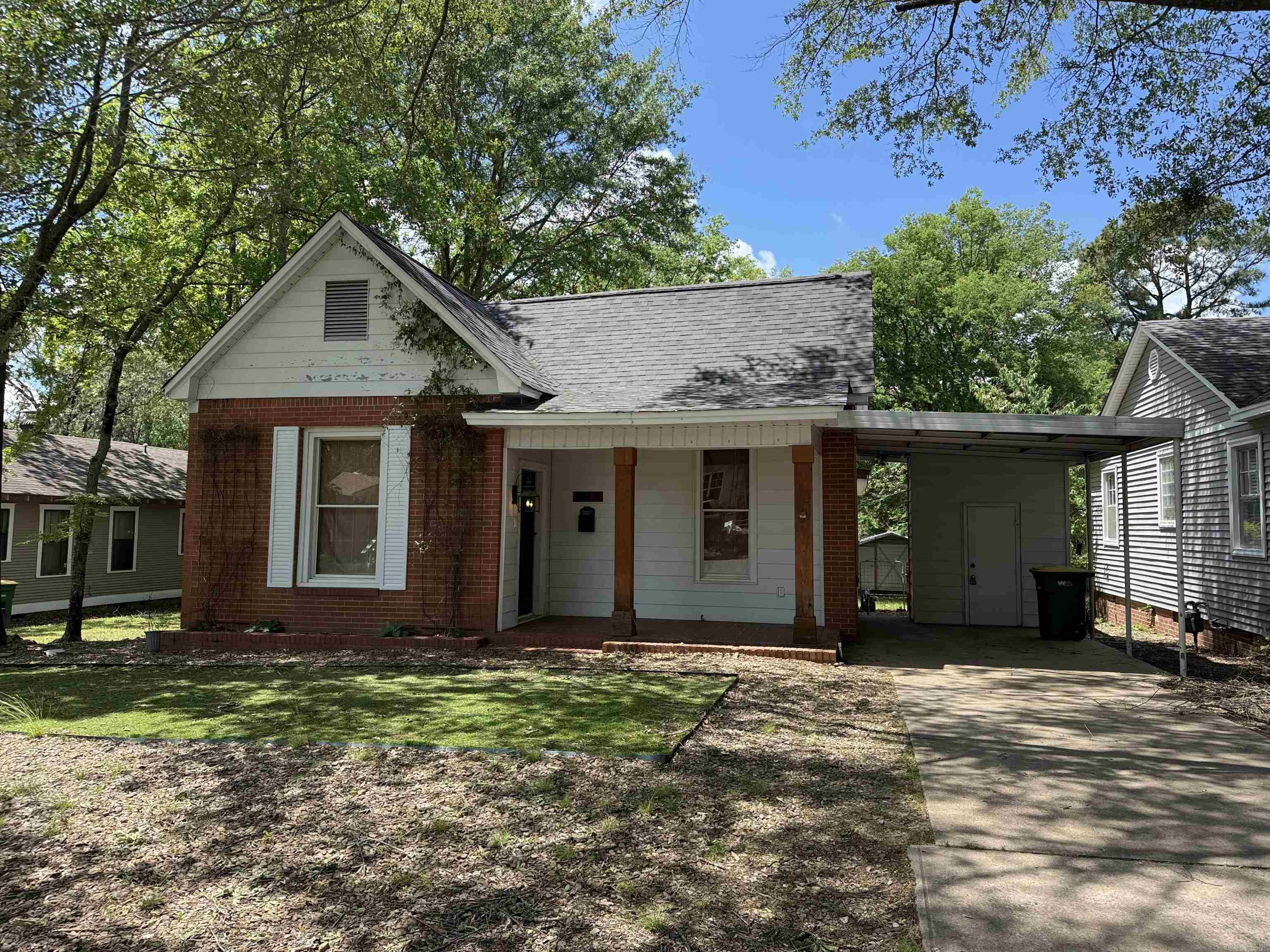 Updated two-bed, one-bath home a block from Forest Park Elementary. Custom cabinetry, custom window treatments, large fenced backyard with two-car carport. Gas range and oven, refrigerator with ice maker, dishwasher, disposal, laundry closet with washer and dryer, tankless water heater, walk-in tile shower, jetted tub, granite countertops with breakfast bar, and serving bar in living room. Must see!