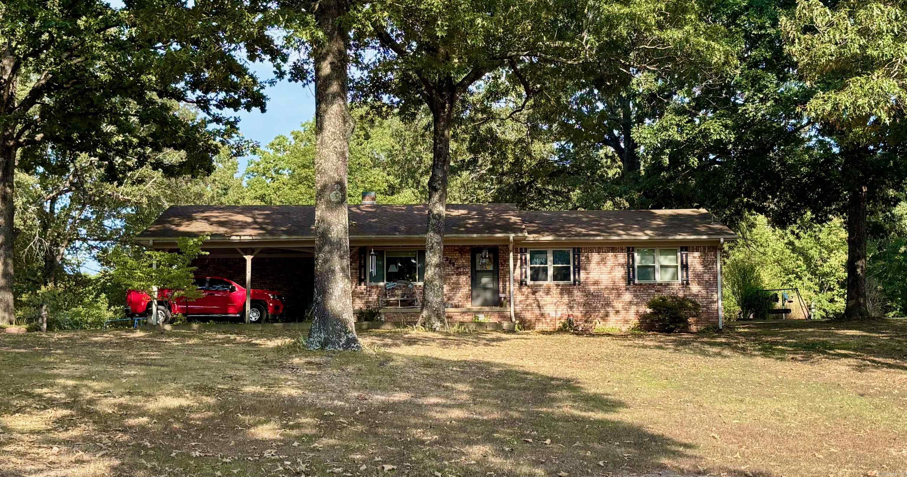 Tucked away on approximately 7 acres in the heart of Randolph County, this 3-bedroom, 2-bath home offers the perfect balance of comfort, privacy, and outdoor adventure. With over 1,500 square feet of living space, the home features a practical floor plan with generous room sizes and a warm, welcoming feel throughout. Designed with flexibility in mind, the home features a layout that can function as two living areas or be customized to include a formal dining room and a cozy living room. The semi-open floor plan allows for easy flow between spaces while still offering distinct, defined areas for relaxation, dining, and entertaining. A detached shop adds valuable space for tools, equipment, or hobbies. Step out back to explore cleared trails that wind through the wooded acreage—ideal for hunting, hiking, or ATV riding. Whether you're dreaming of a peaceful country lifestyle, a recreational getaway, or land to make your own, this property delivers space, seclusion, and opportunity just minutes from town conveniences. Don’t miss out—schedule your showing today!