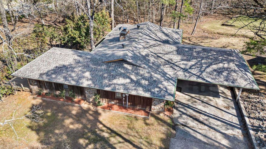 2500 E 8th St – *** NEW ROOF & GUTTERS***   Rare find in Danville! This 2,112 sq ft, 3 bedroom, 2 bathroom home sits on 26 acres inside the city limits, offering space, privacy, and convenience all in one property. Inside, you’ll find a beautiful rock fireplace, real cypress siding throughout, and plenty of character.   The property also includes a 2-car carport, 15x37 ft storage barn, multiple garden spots, and a gazebo—perfect for outdoor living and hobbies. Recreation is right at your doorstep with the Peeler Gap Shooting Range just minutes away, plus quick access to the Ouachita National Forest, Petit Jean State Park, Mount Magazine, and Mount Nebo. Hunting, hiking, camping, and ATV adventures are all nearby. Danville also offers strong employment opportunities with several large industries close by!