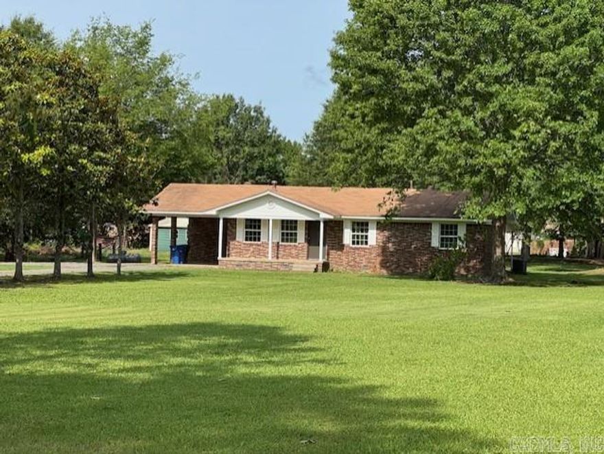 Complete remodel with 5 acres in city limits.  Zoned A-1.  Property is partially  fenced.  Recently updated, new paint, windows, HVAC,  New LVT flooring.  New appliances and a covered patio the length of the home.  Large 30 x 25  shop.  Beautiful property and  garden space.  Ideal for a "mini" farm or a perfect space for a commercial business with the house being the office. 539' of street frontage for large trucks to maneuver.  NO DISCLOSURE.