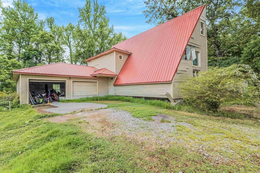 Priced Under Market Value! This unique A-Frame home brings loads of potential for the right buyer. This home sits off the road on a spacious 4.10 acres of a tree-lined lot with a gated entry way providing you with plenty of seclusion, plenty of room to have a garden, play ball, ride wheelers, dirt bikes, build shop etc. The exterior has endless of opportunities that just needs you to bring your ideas to life. The interior provides plenty of space with vaulted ceilings, the master bedroom is downstairs with 2 bedrooms and bath upstairs. There is even space in the attic that could be made into living space for a bonus room. Lots of storage space throughout this home. Schedule a showing, bring your ideas, and make this place into a place to call home. There will not be a sellers disclosure provided.