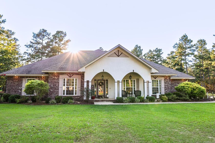 Beautiful home sitting on 3 acres with 3 bedrooms, 2.5 baths and a custom built pool.