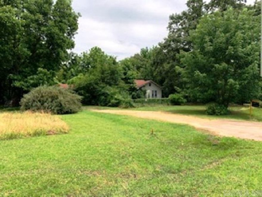 LOCATION, LOCATION. 1.52-acre COMMERCIAL LOT at prime intersection in Camden, Arkansas. Corner lot at high-traffic intersection of Cash Road and US HwLOCATIONy 79S/California Av, 1 mile from US Hwy 278 & US Highway 79 Bypass. Survey and elevation certificate are in the file for review upon request. This commerical-zoned location enjoys traffic leading to and from Camden and Magnolia. Camden Fairview High School is ½ mile away; other schools in district are less than 3 miles away.   This commercial lot is less than 2 miles from hospital and police facilities and 2.5 miles from county courthouse and various municipal services, as well as sites for multiple community festivals. Businesses near the property include gas station, medical and professional offices, restaurants, grocery stores, service businesses, and others.   Camden's Industrial Park is 15 minutes away and hosts an array of world-class defense and manufacturing companies including Lockheed Martin, Aerojet Rocketdyne, National Technical Systems, Raytheon Missile Systems Company, Spectra Technologies LLC, and more, as well as Southern Arkansas University Tech.   This commercial lot is also an easy 20-40 minutes from expandi