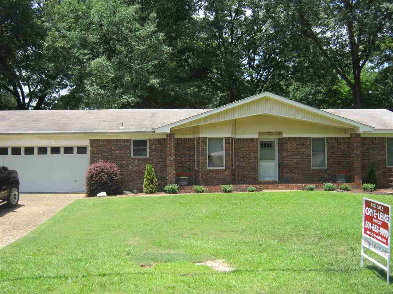This home is MOVE IN READY, with brand new Carpet and Paint. This home has been well maintained and priced to sell. It has a wood burning fireplace in the living room, and has gas logs in an awesome sun room on the back. This home is within walking distance to school and has a huge back yard with a storage building along with beautiful mature trees. Firm on price, but priced correctly schedule your tour today.