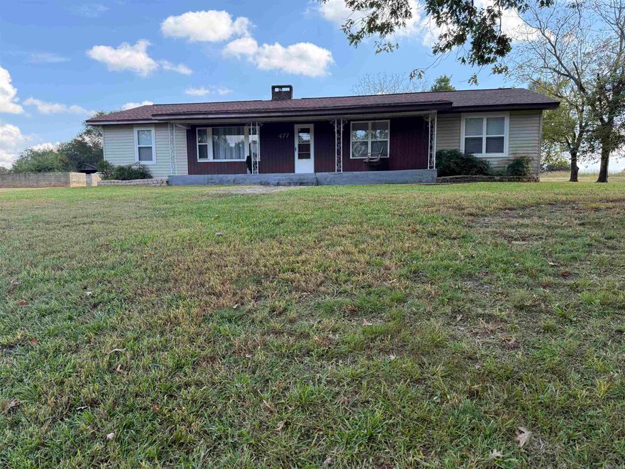 Country setting, approx 11 miles east of Nashville, paved road frontage.  House offers approx 1,770 sq ft of living space, 3 bedrooms and 2 full baths. Large living room, spacious kitchen, appliances to convey, including refrigerator and stove. Lot to be surveyed, seller to install new CH/CA unit at closing.  12x20 storage building conveys. Home is move in ready.