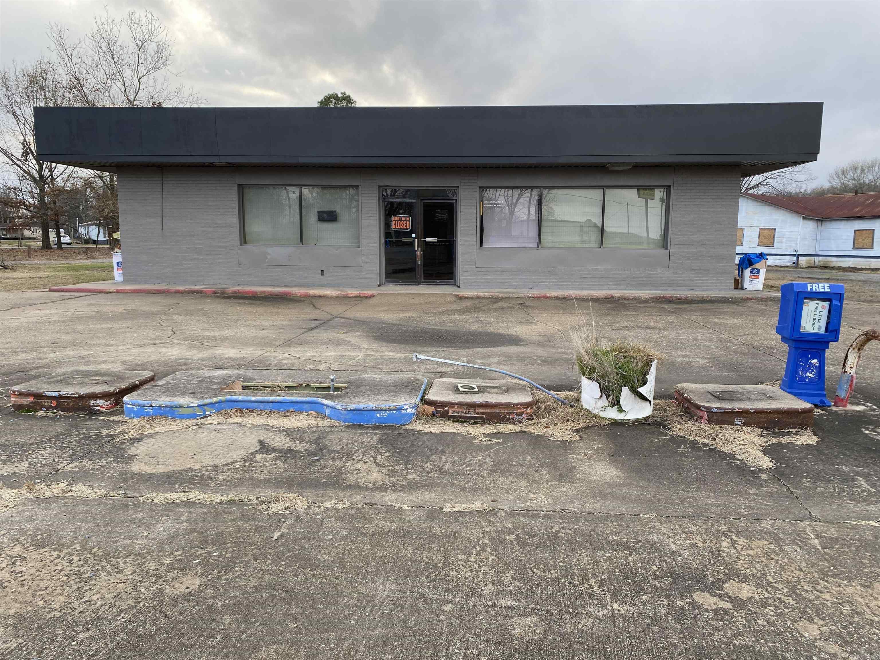 What are you waiting for?? Opportunity awaits at this property! Restaurant equipment and furnishings included, and with this incredible location, this property has a world of potential. High traffic and visibility doesn't get any better than this making your business exposure huge! Maybe a donut/coffee shop, or a BBQ or any other kind of restaurant, or any type of business. Duck hunters..what about a lodge in the heart of things? So many options and so much potential. AGENTS SEE REMARKS