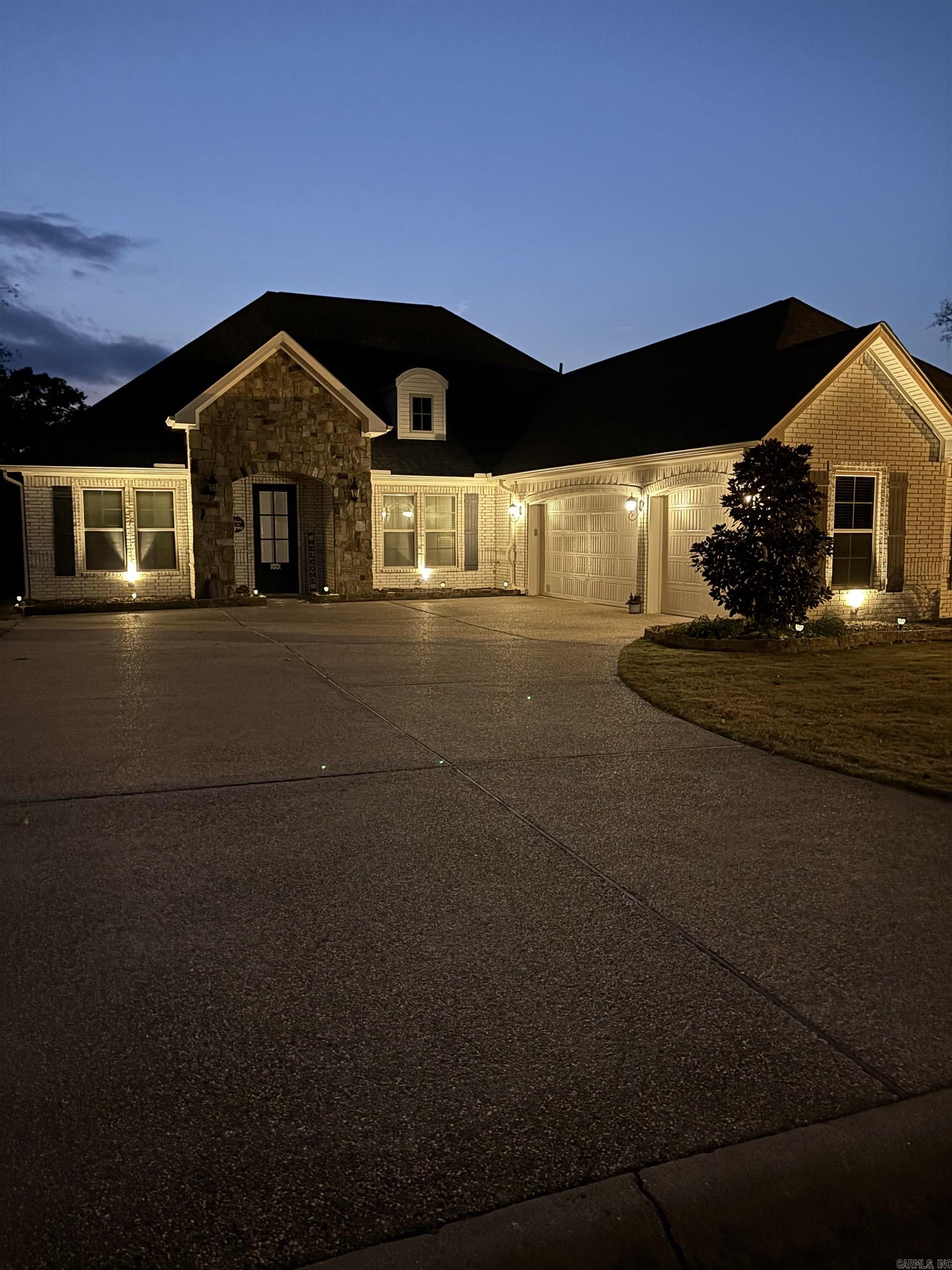 Carriage Custom Home! Welcome to 135 Callaway Circle, a beautiful 3BR/2BA home in Hot Springs' desirable Glencairn neighborhood. With 2,088 sq ft on a .38-acre lot, this home features an open floor plan, elegant white brick and stone exterior, and a 3-car side-load garage. Inside, enjoy a chefās kitchen with gas cooktop, double ovens, island, walk-in pantry, and breakfast nook. The spacious primary suite includes a spa-like bath and walk-in closet with direct laundry access. Recent upgrades include a 2023 architectural roof and gutters, plus energy-efficient features like a tankless water heater and in-ground sprinkler system. Relax on the covered patio in the fully fenced backyard lined with magnolia trees. Glencairn offers walking paths, ponds, and a welcoming entranceāplus no rentals allowed, preserving its peaceful charm. Donāt miss your chance to call this stunning home yours!Ā Ā Check on the POA website -- www.glencarin.vinteumneigbrs.com