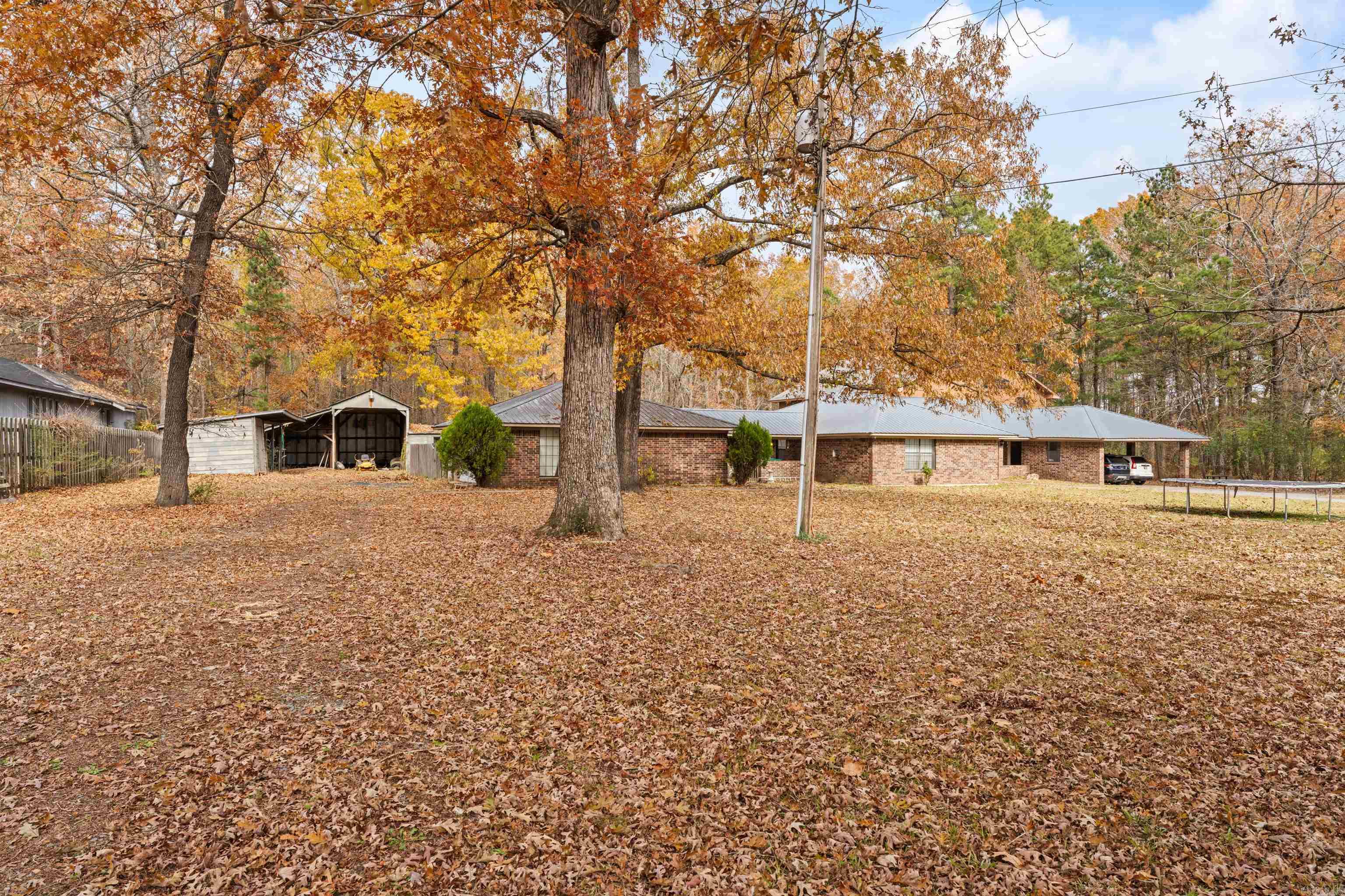 If you are in the market for lots of space, this is the property for you! On just over an acre, this home provides 5 bedrooms, 3.5 bathrooms with one being a jack-n-jill, an office, and a craft room. All bedrooms are very spacious. The living room has a 24-foot vaulted ceiling and a 22-foot Christmas tree closet. Large garage/workshop for storage needs. The property has an in-ground swimming pool that just needs a little TLC for when the warmer weather comes. You'll want to have all of your family gatherings here!