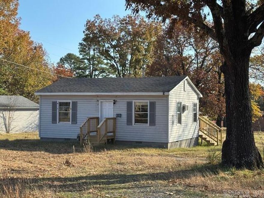 Tiny Home on a Great Big Lot! This 2 Bedroom 1 Bath Country Cabin Style Home sits on almost a half acre lot in Southside. This home is considered move in ready with new flooring, a new sink, cabinets, and countertops in the kitchen, new electric water heater, new shingles, and new front porch and back deck! OWNER FINANCING OPPORTUNITY!