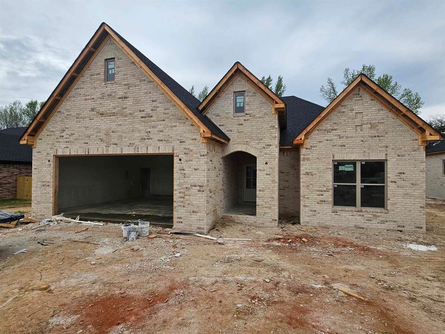 Refined new construction 3-bedroom home showcasing an elegant open-concept design with elevated modern finishes throughout. A thoughtfully curated palette of organic, neutral tones creates a sophisticated and timeless interior. The kitchen flows seamlessly into the living and dining spaces and features a dedicated pantry for enhanced storage and functionality. The private primary suite offers dual walk-in closets and a spa-inspired bath. Meticulously designed for both style and comfort, this home blends modern luxury with effortless livability. Home is still under construction and has an estimated completion for the end of May 2026.