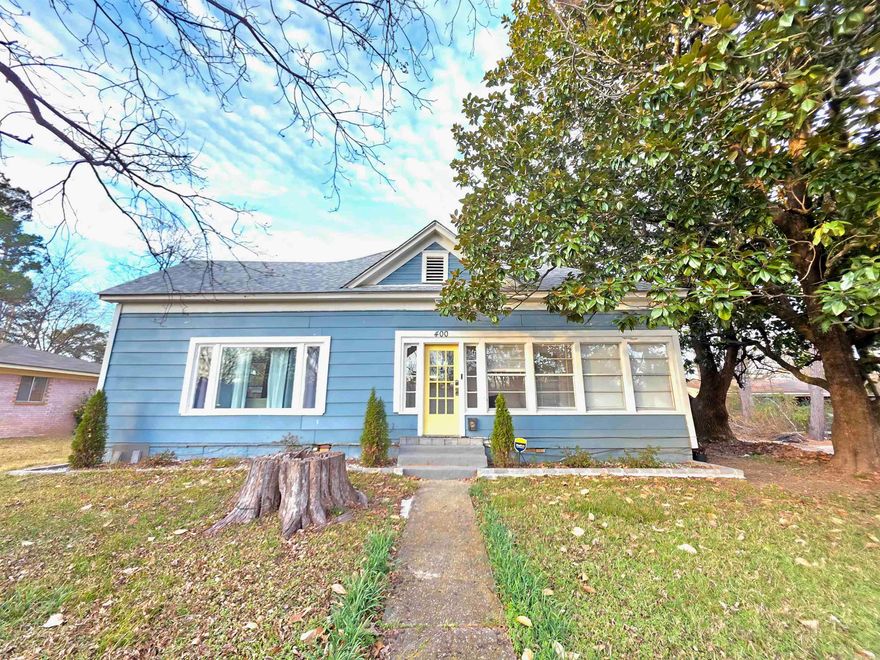 You will feel the nostalgia of historic Hot Springs in this lovely home with it's combination of the retro 20's era with modern elegance! Literally a few mins from the Oaklawn Racing, about a 10min walk. Very cozy and spacious with high ceilings, real hardwood floors, and large windows that provide an abundance of natural light. Also has a covered porch to sit and enjoy a cup of coffee reminiscing the golden era of Hot Springs! This home is super cute, and in a great location. There are some homes that are so unique and have a feel that when you walk in, you know that it has history and a story in the walls. This is one of them! Whether as an investment property, vacation home, downsizing, first time buyers, the options are many... make your story in this home Today!