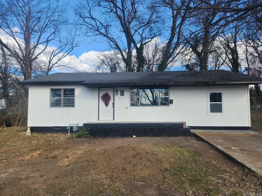 Whether you are looking for an investment opportunity or a home to call your own. Come take a look at this recently remodeled 3 bed/2 bath home in the heart of town! The big-ticket items have already been taken care of: 2 FULL bathrooms remodeled, designated laundry room, NEW HVAC unit, new fans and light fixtures, an open and airy kitchen with custom-made cabinetry, new sheetrock, paint and flooring throughout. Sitting on a corner lot, there's room to build your shop. The extra perk... this lot is zoned C1, if you are looking to have your business and live next door, here is your chance! You too can be part of our local business owner community. Walking distance from shopping, banking and schools. Call to make an appointment!