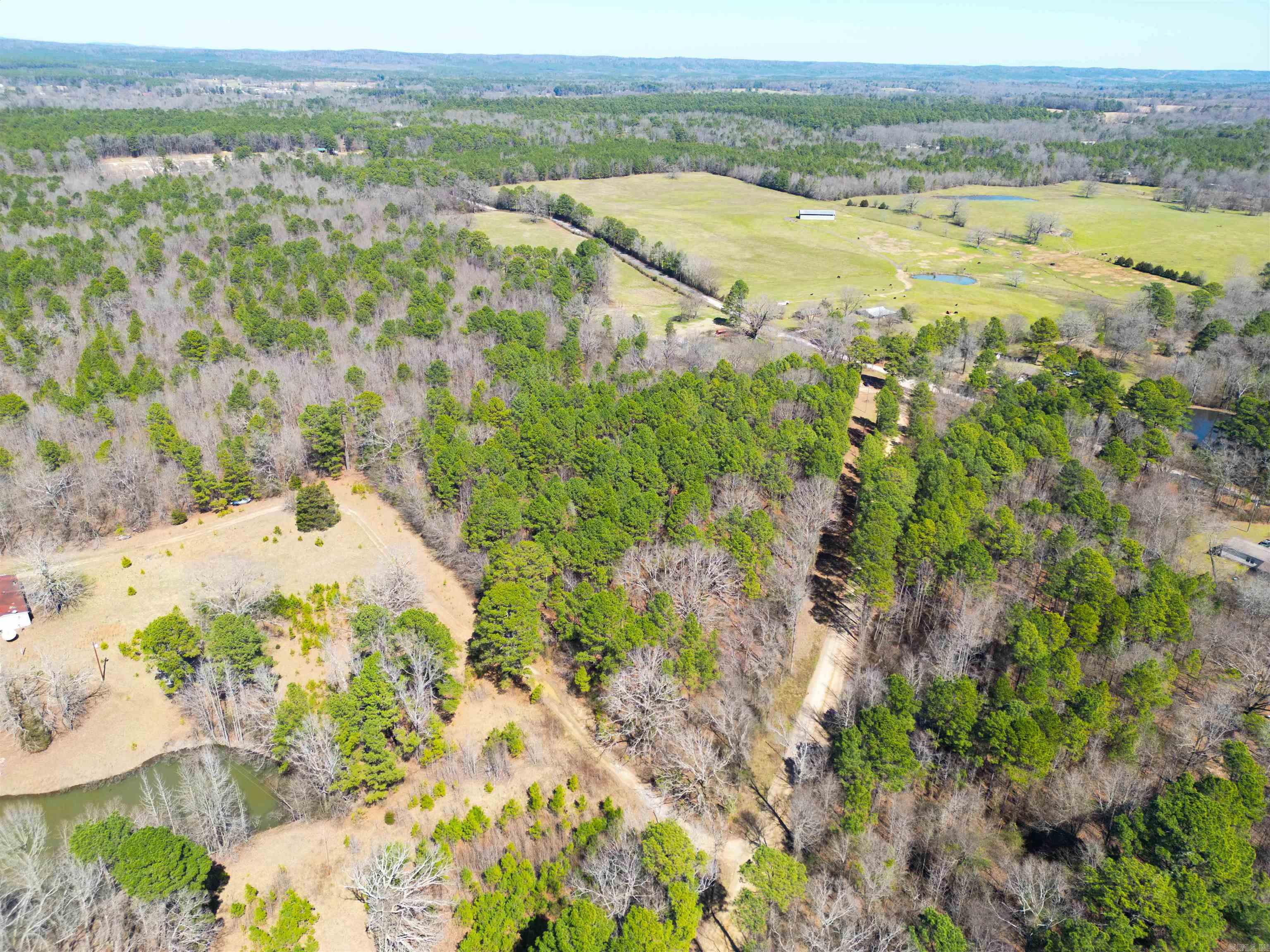 This 5.25 acre lot is ready for you to make it your own! Bismark school district, with a fixer upper home on the land as well.