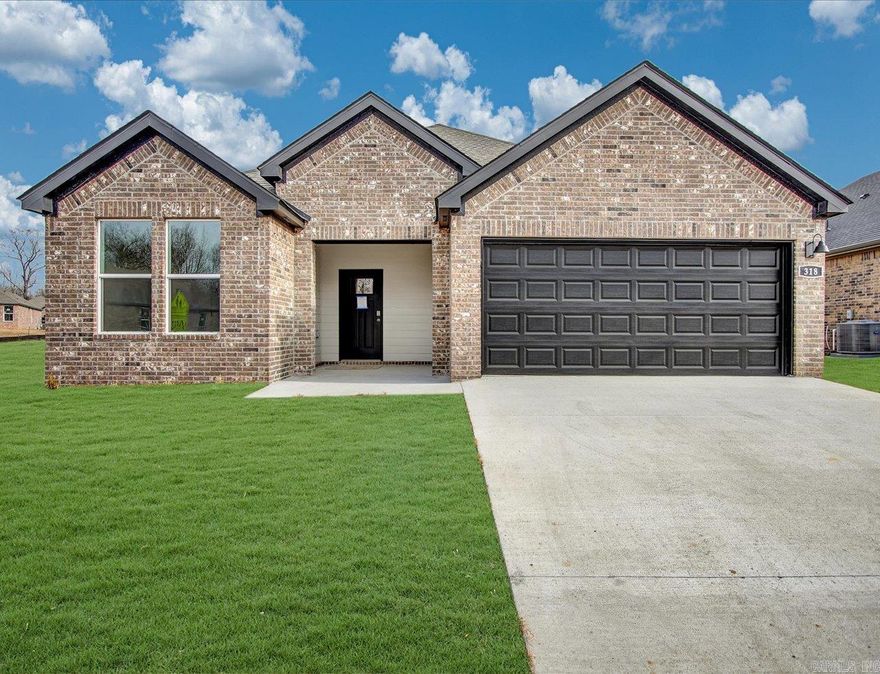 Delightful Denton plan! Indulge in the ultimate living experience at The Reserve at Country Club. These meticulously crafted single-family homes are designed to offer unparalleled comfort, luxury, and convenience. Located on the serene southeast side of Maumelle, you will find yourself surrounded by breathtaking natural beauty, yet only minutes away from schools, world-class golf courses, and a plethora of dining options. Come and experience the lifestyle you've always dreamed of in a brand-new home in The Reserve at Country Club! These homes will be 4 sides brick! Living room will showcase a beautifully modern Electric Fireplace. Exquisite quartz counters in the kitchen and bathrooms, beautiful kitchen backsplash and 42'' cabinets. Primary bath features a walk-in shower! LVP flooring with carpet in bedrooms and closets! Tax amount TBD. HOA fees cover management and other. Photos are representative only and may vary as built. At the Builder discretion, some homes may just have a walk-in shower only and may have carpet. HOA will have a $75 transfer fee.