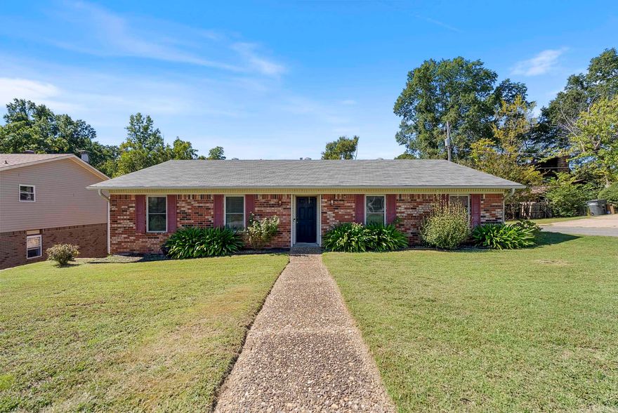 Beautifully maintained 3 bedroom, 2 bath home in a quiet neighborhood.  Two inviting living spaces offer flexibility for entertaining, or relaxing by the fireplace. Interior features include fresh paint, granite countertops, and abundant natural light. The kitchen offers ample cabinet space and connects seamlessly to a spacious dining area. A side-entry garage accessed by a shared drive preserves curb appeal while adding privacy. Major updates include a 3-tab shingle roof replaced in 2020 and HVAC system installed in 2019. Outside, enjoy a covered back deck overlooking peaceful green space where deer often wander through the yard. With its quiet surroundings, updated systems, and natural setting, this home is move-in ready and perfectly suited for modern living with a touch of nature.